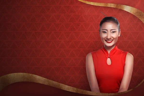 Mujer china en cheongsam vestido sonrisa — Foto de Stock