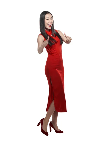 Woman in cheongsam dress showing thumbs up — Stock Photo, Image