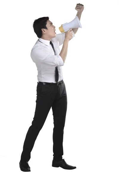 Азиатский бизнесмен кричит на мегафон — стоковое фото