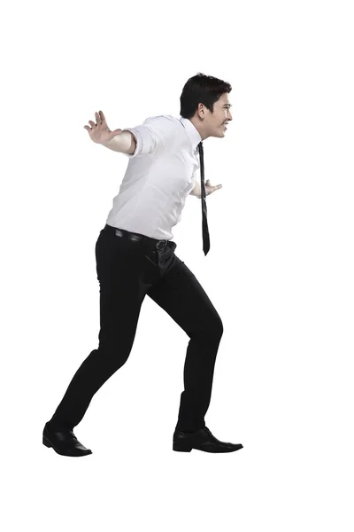 Asiático hombre de negocios caminar cuidadosamente —  Fotos de Stock