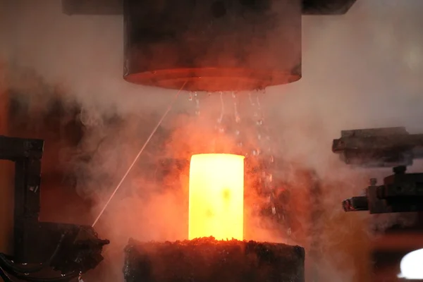 Automatic hot stamping process of grinding balls — Stock Photo, Image