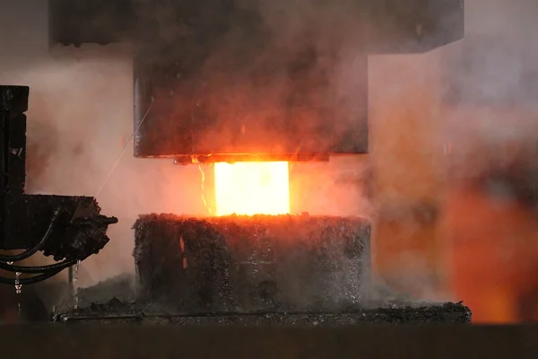 Automatic hot stamping process of grinding balls — Stock Photo, Image