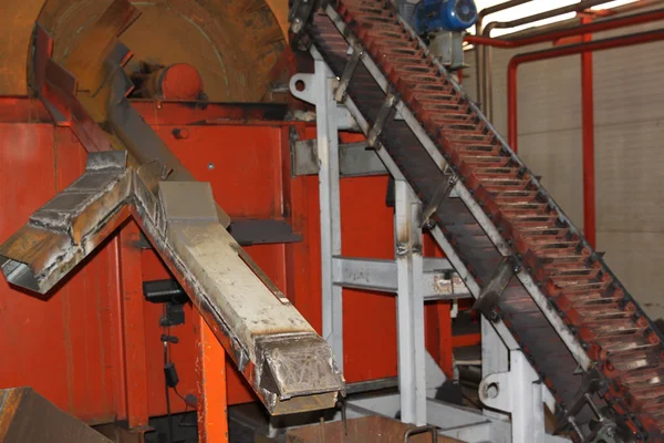 Elevator for lifting hot grinding balls — Stock Photo, Image