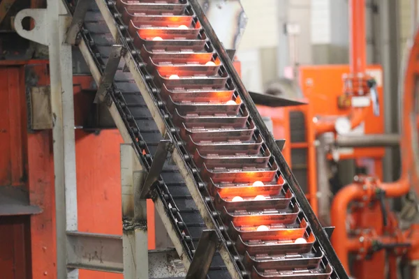 Elevator for lifting hot grinding balls — Stock Photo, Image