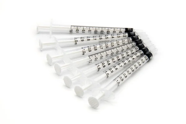 Seven Medical Vaccine Syringes White Background — Stock Photo, Image