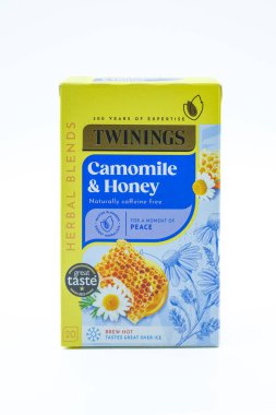 Irvine, Scotland, UK - November 17, 2025: Twinings branded Camomile and Honey Tea Bags in a cardboard container displaying relevant graphics and icons relative to the image.