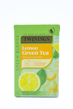 Irvine, Scotland, UK - November 17, 2025: Twinings branded Lemon Green Tea Bags in a cardboard container displaying relevant graphics and icons relative to the image.