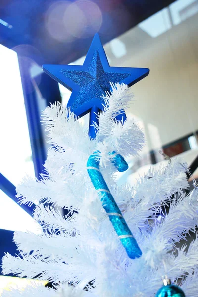 Blue Star Candy Cane Decorated Top White Christmas Tree — Stock Photo, Image