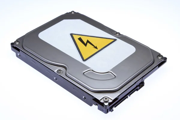 Hard disk with a sticker — Stock Photo, Image