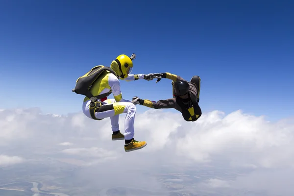 Sports parachutists building a figure — Stock fotografie