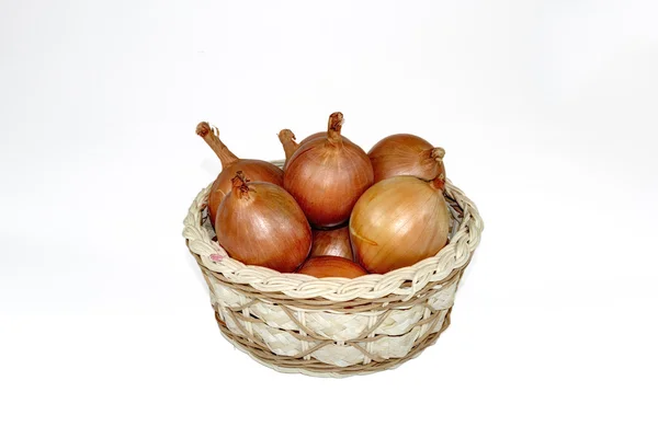 Ripe onions in basket — Stock Photo, Image