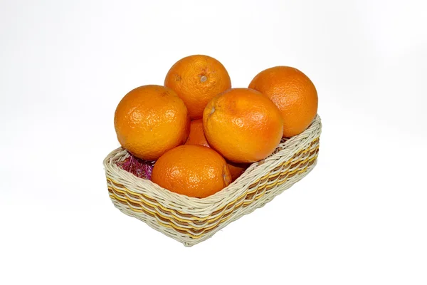 Ripe oranges in the basket — Stock Photo, Image