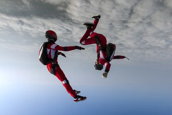 Sport parachutists  build a figure in free fall. — Stock Photo, Image