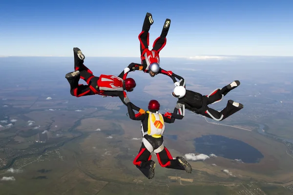 Skydivers topladığı şekil batmak üzere. Stok Fotoğraf