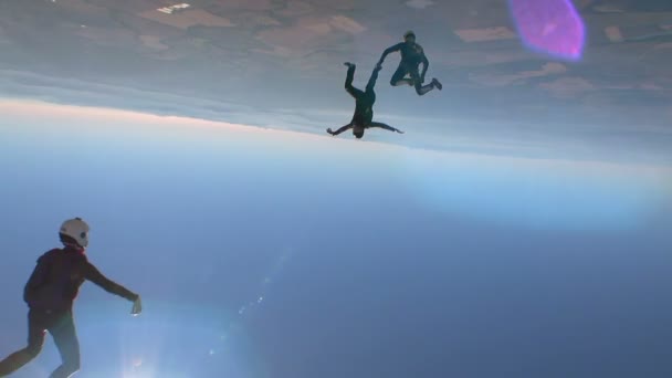 Skydivers recolhe figura em queda livre — Vídeo de Stock