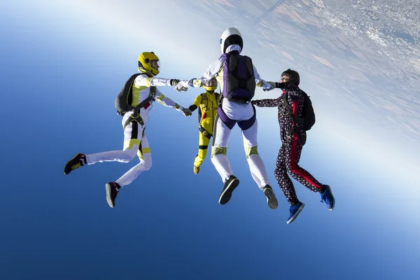 Group collects figure skydivers — Stock Photo, Image