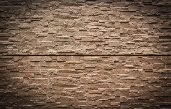 Mur de pierre texture rustique fond brun — Photo