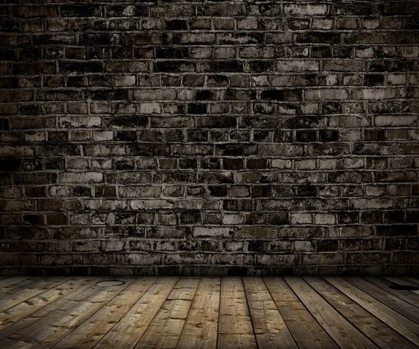 Interiör med tegel grå vägg och trä golv — Stockfoto