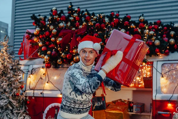 Young Boy Santa Claus Presenting Gifts Christmas Bus — Stock Photo, Image