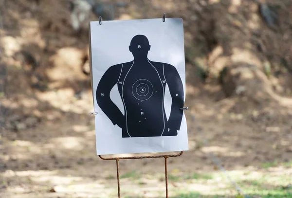 stock image Target practice at outdoor shooting range. paper target and steel plate target