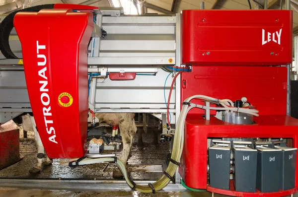 Red milking robot — Stock Photo, Image