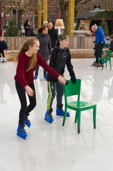 Skating with a chair — Stock Photo, Image