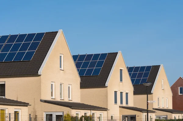 Houses with solar panels — Stock Photo, Image