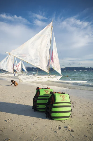 Life jackets on beach — Stock Photo, Image