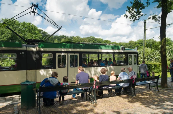 People waiting for tram — Stock Photo, Image