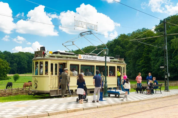 People waiting for tram — Stock Photo, Image