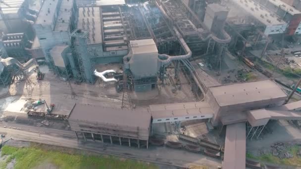 Flying over a large metallurgical smoking plant. Large metallurgical plant top view. Industrial exterior of a large enterprise — Stock Video