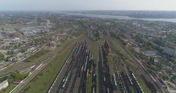 Large industrial railway depot top view. Flight over the railway depot. Freight trains at the depot — Stock Video