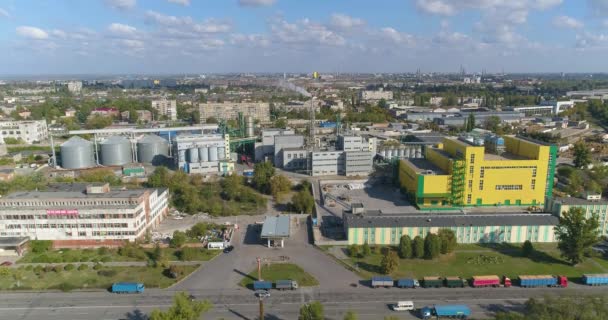 Food processing factory aerial view. Yellow food factory aerial view. Modern food factory. Flight near a modern factory — Stock Video