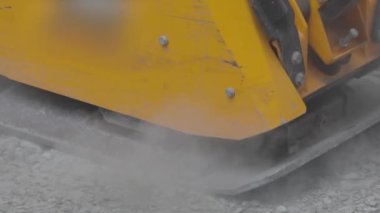 Tokuşturucu. Toprak titreşimli plaka. İnşaat Çalışma Akışı