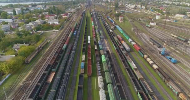 Large industrial railway depot top view. Flight over the railway depot. Freight trains at the depot — Stock Video