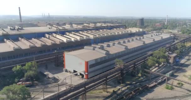 Fly over the production halls. Flight over the premises of the plant. Large workshops, view from the air. Modern production halls top view — Stock Video