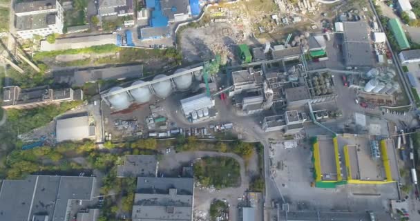 Flight over the industrial area. Many factories next to each other top view. Industrial area with modern factories top view. Plant top view. Yellow plant — Stock Video