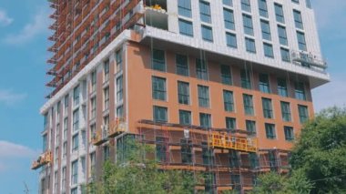 Binanın inşaatı. Binanın dışını araştırın. Konut inşaatı