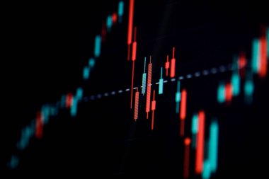 Bilgisayar ekranında bir şamdan çizelgesinin ayrıntılarıyla sığ alan derinliği (seçici odak).