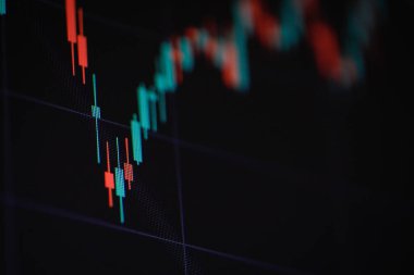 Bilgisayar ekranında bir şamdan çizelgesinin ayrıntılarıyla sığ alan derinliği (seçici odak).