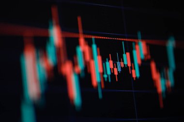 Bilgisayar ekranında bir şamdan çizelgesinin ayrıntılarıyla sığ alan derinliği (seçici odak).