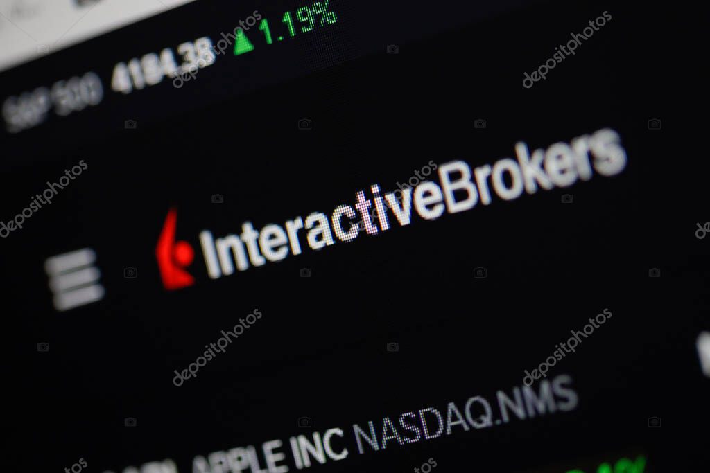 Bucharest, Romania - April 24, 2021: Shallow depth of field (selective focus) and macro image with Interactive Brokers app on a digital screen.