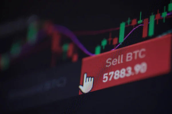 Shallow depth of field footage with details of Bitcoin cryptocurrency price fluctuations on a crypto exchange app, on a digital screen.