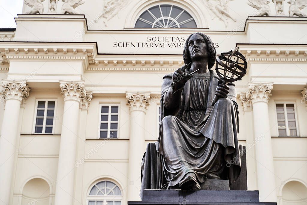 Warsaw, Poland, Nov 15, 2018: Nicolaus Copernicus Monument in front of Staszic Palace, seat of the Polish Academy of Sciences