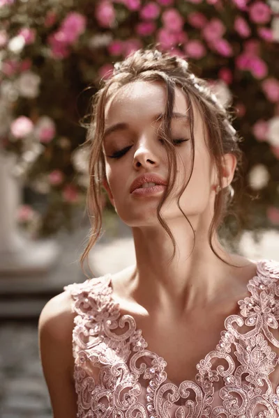 Closeup portrait of beauiful European girls bridesmaid in pink dress — Stock Photo, Image