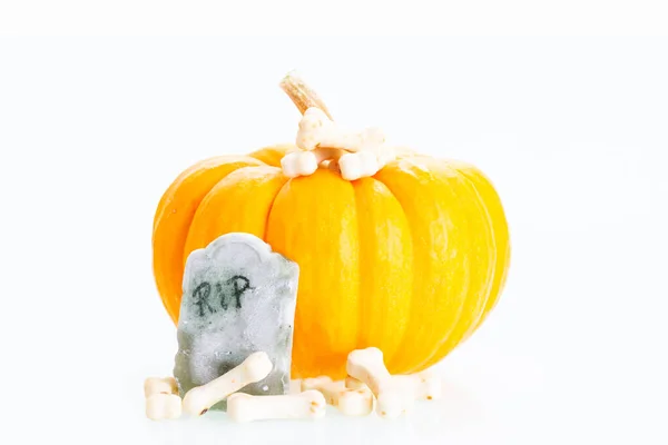 Halloween Concept Miniature Pumpkin Tombstone Bones Candy White Background — Stock Photo, Image