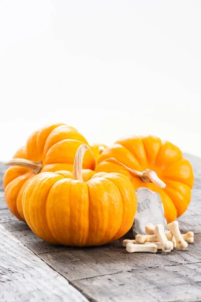 Halloween Concept Pumpkins Tombstone Bones Candy Wooden Table — Stock Photo, Image