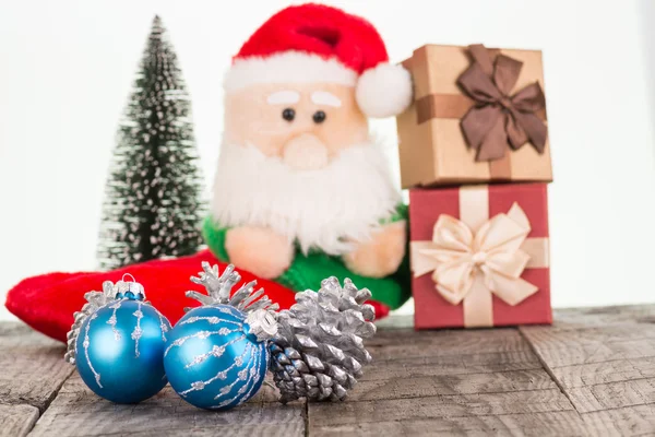 Christmas baubles and Santa Claus toy background — Stock Photo, Image