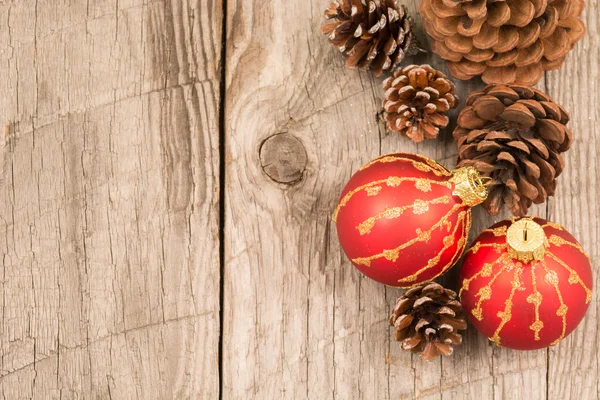 Christmas baubles and pine cones — Stock Photo, Image