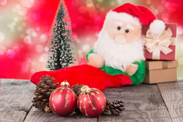 Vánoční ozdoby a Santa Claus hračka pozadí — Stock fotografie